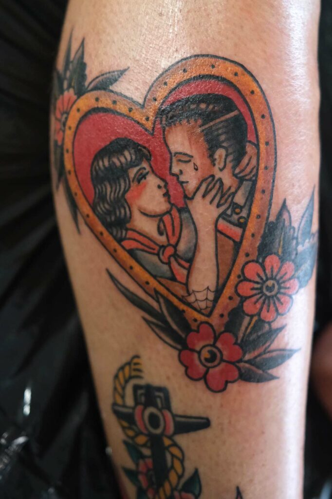 couple in heart as traditional tattoo in berlin