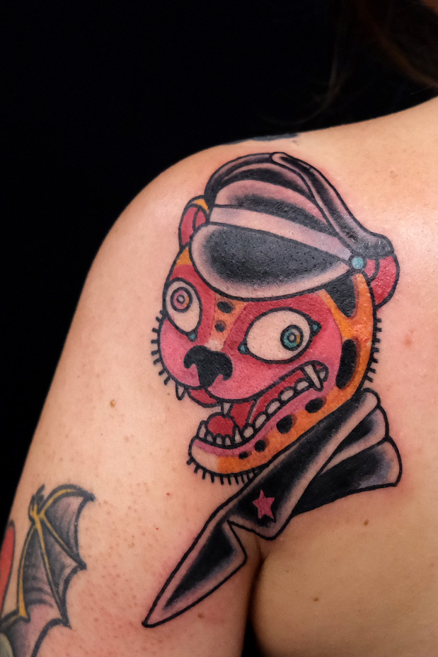 crazy tiger as traditional tattoo in central berlin