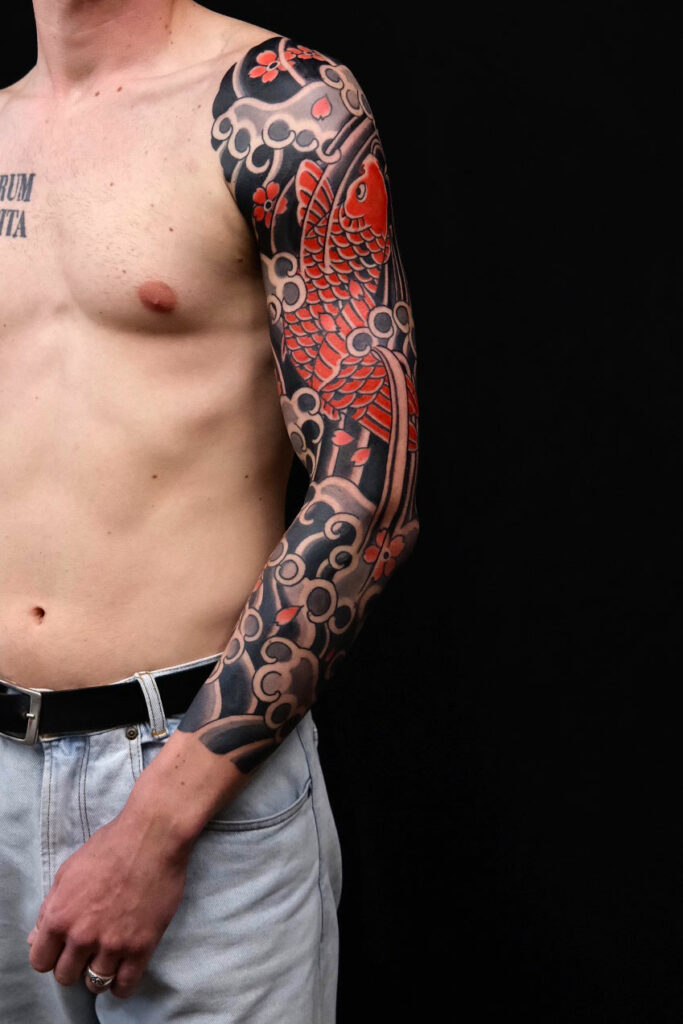 Koi sleeve by Swen Losinsky at Good Old Times Tattoo Berlin