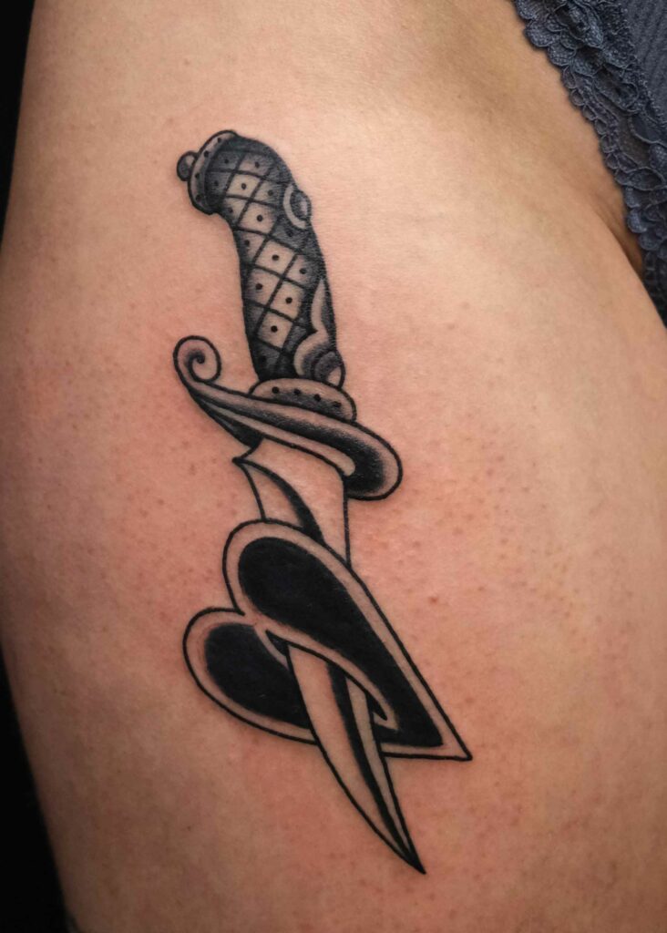 traditional dagger and heart by Swen Losinsky at good old times tattoo berlin