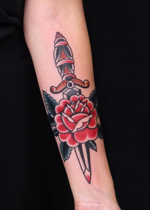 Dagger with rose on underarm is a good option for custom walk-in tattoos