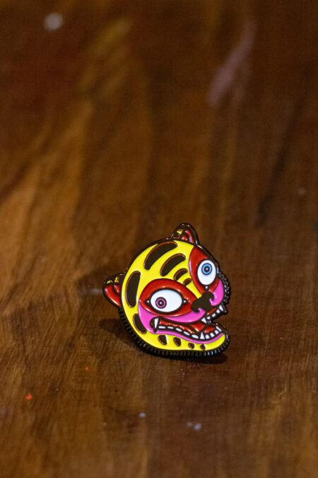 enamel pin featuring a crazy tiger front view