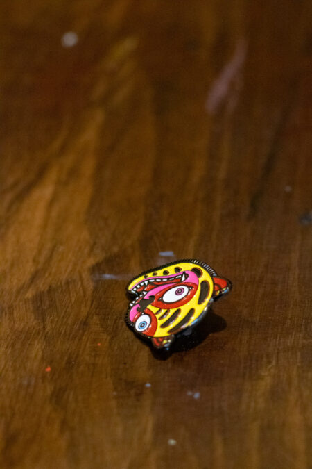 enamel pin featuring a crazy tiger front view 3