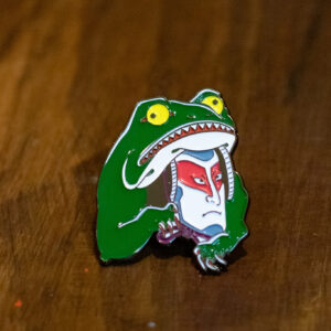 enamel pin featuring a kabuki frog front view